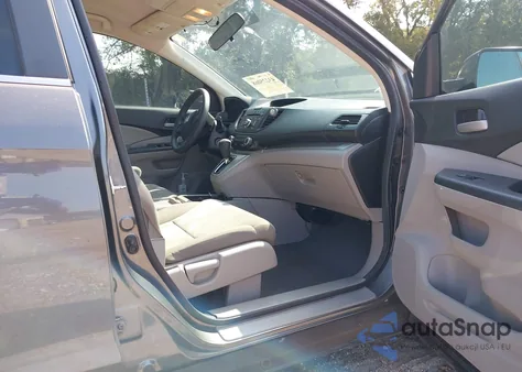 2014 Honda Cr-V Lx z USA, uszkodzony, nr VIN 2HKRM3H32EH517841